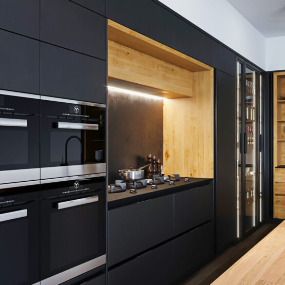 3 boyutlu-rendering-modern-luxury-black-kitchen-with-wooden-decoration-interior-design-concept-1-1 - Maydek İnşaat İzmir