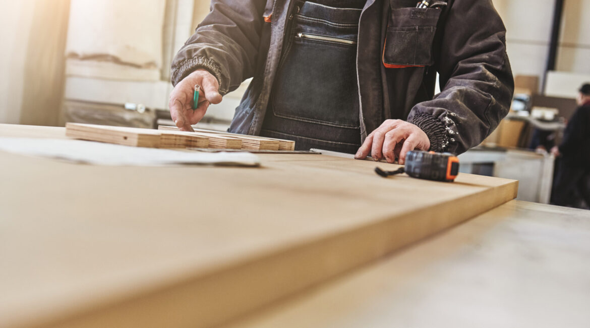 Cropped image of a craftsman working at his workstation - Maydek İnşaat İzmir